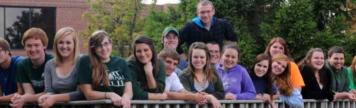 HU students posing in front of the deck. 