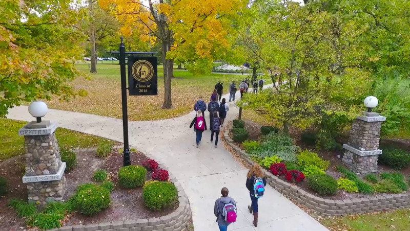 Aerial picture of campus with students walking towards classes. 