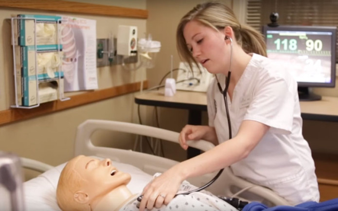 HU students practicing with a specialized patient simulator. 