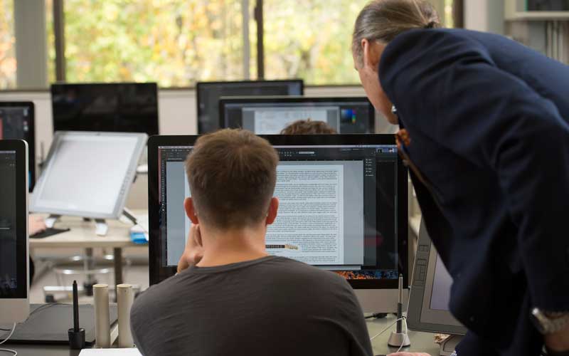 HU student reading over an article.