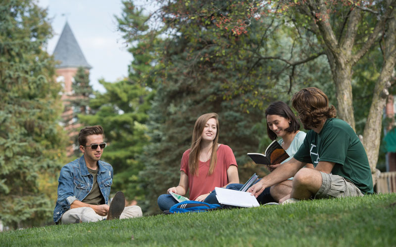 HU students studying outside.