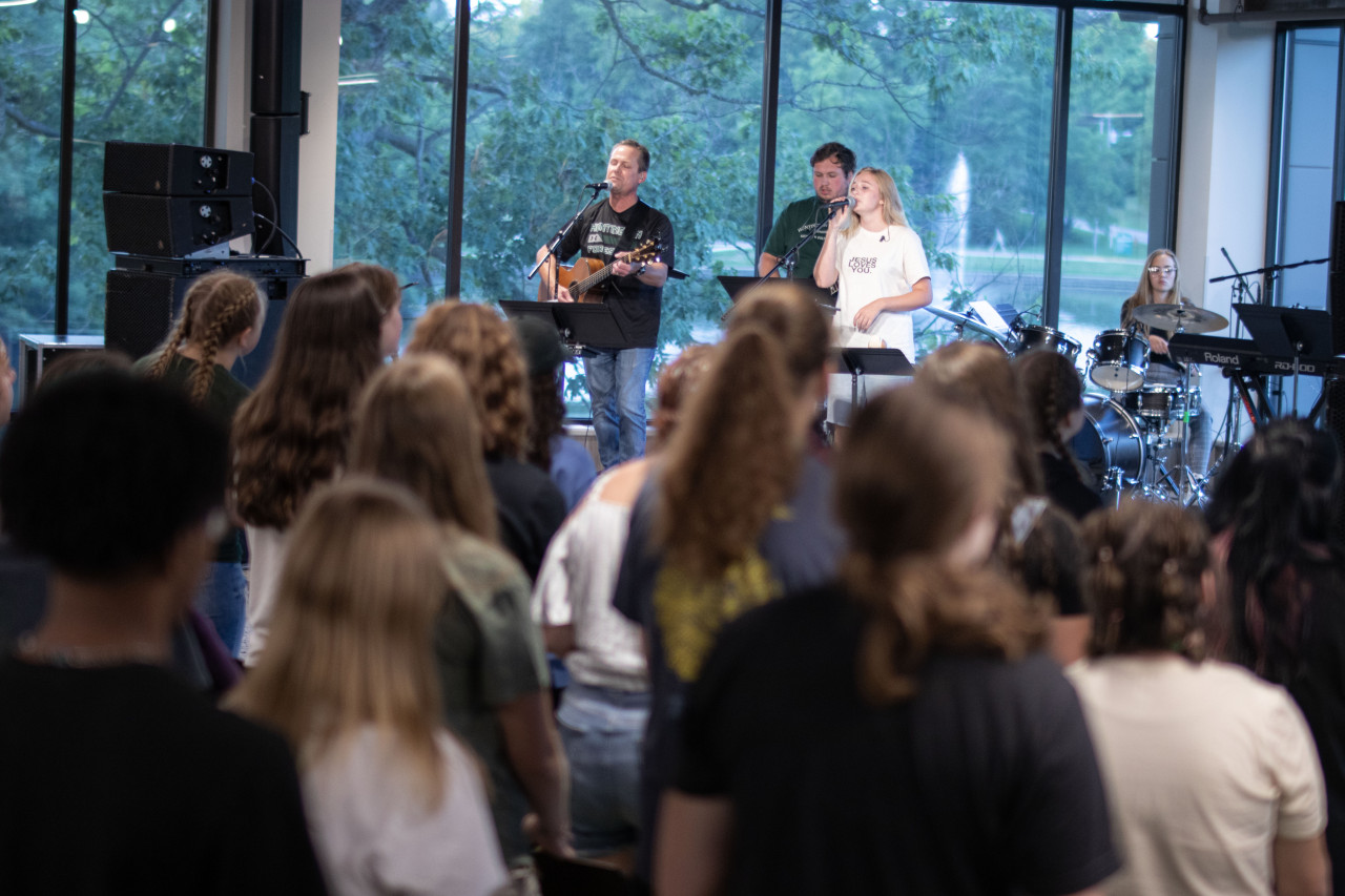A worship band leads at a student event at Huntington University.